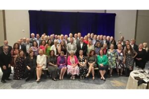 Diana Dykstra (center), former President and CEO of the California and Nevada Credit Union Leagues, with fellow colleagues and leaders at a recent retirement celebration in her honor.
